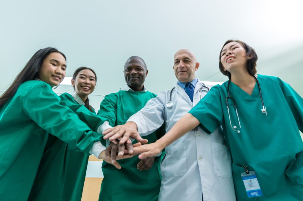 Surgeon team in an operating room . Doctor team standing in the hospital.